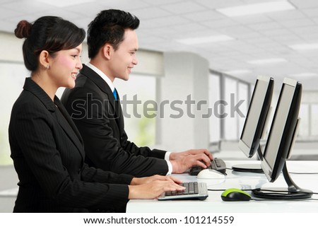 woman and man office worker working in the office
