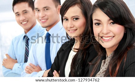 close up Portrait of a woman and man office workers smiling isolated on white background