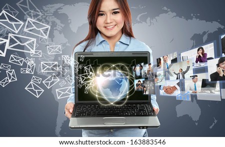 Portrait of businesswoman using laptop and showing communicating with his team across the world. International communications concept