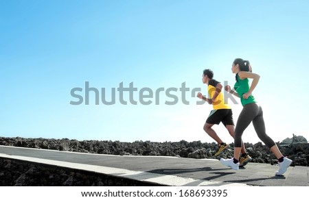 Sport - Asian Couple Running Outdoor Doing Exercise