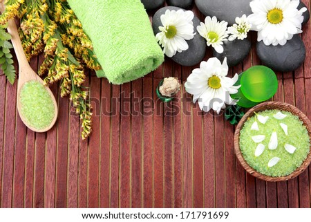 spa. zen basalt stones and flower on the wood with copy space