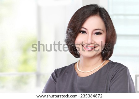portrait of mature happy business women smiling