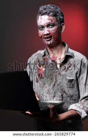 Zombie computer maniac looking camera write email