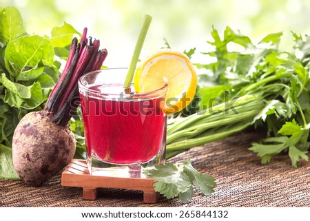 glass beet and vegetables mix into a refreshing juice
