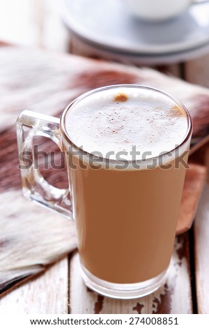 portrait of a glass of coffee latte for coffee break