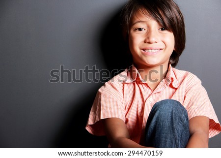 close up portrait of beautiful smile from handsome little boy with copyspace