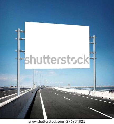 Blank White Blank board or billboard or roadsign in the road under the bright blue sky