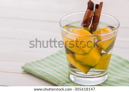 Summer fresh fruit Flavored infused water mix of mango and cinnamon