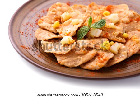 close up portrait of indian street food papri chaat isolated on white background