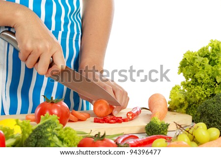 close up of hand cutting a healthy food on the table in the kitchen