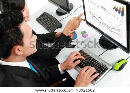 woman and man office worker working on computer in the office