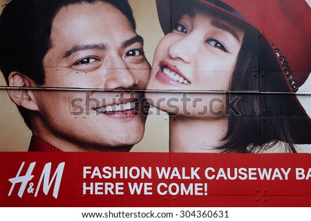 --HONG KONG  March 2015 :  Advertising of famous  shwedish company H & M. in Hong Kong .  H & M., Europe\'s largest retailer of clothing. Headquartered in Stockholm, Sweden.