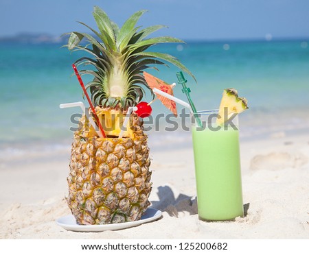 Fresh fruit cocktail on a tropical island beach