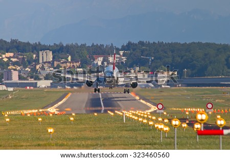 ZURICH - JULY 18: Airbus A-319 Swiss Air landing in Zurich after short haul flight on July 18, 2015 in Zurich, Switzerland. Zurich airport is home for Swiss Air and one of biggest european hubs.