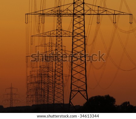 Power poles in the soft evening sky light