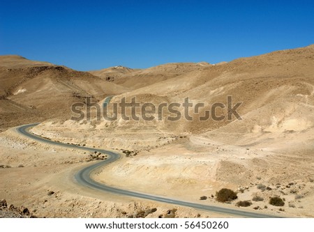 Twisting road among desert