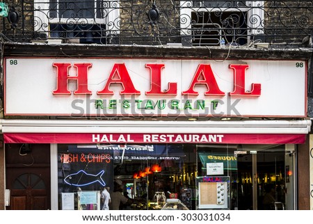 London, England - September 01, 2013: Halal Restaurant Sign, Halal food is permitted under  Islamic law, as defined in the Koran.