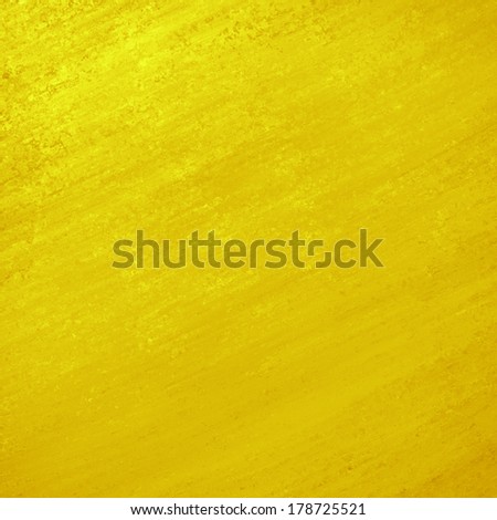 Solid yellow gold background wall paint with detailed diagonal background texture brush strokes on bright color luxury background layout. Gold brochure paper, elegant rich golden background design.