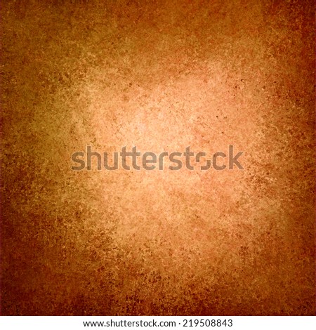 autumn background colors. gold orange warm background with vintage texture and center light