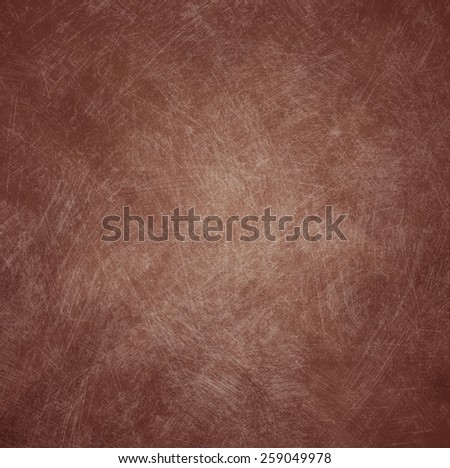 abstract blurred geometric pattern dark brown background with shabby distressed vintage background texture and soft center lighting for text
