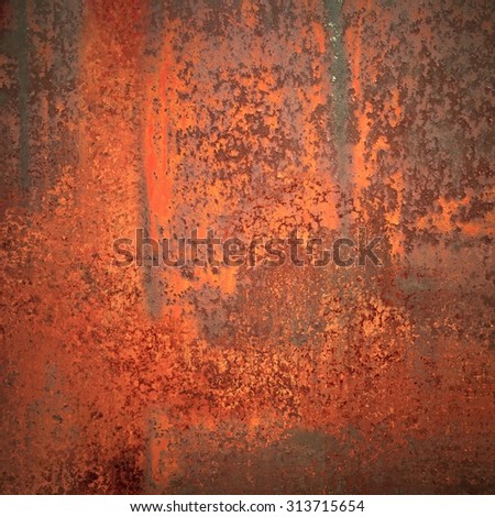 old rusted metal with peeling red and orange paint