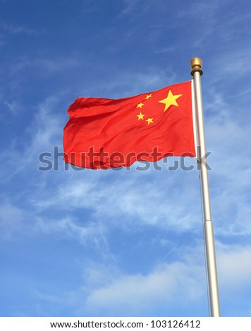 Chinese flag against blue sky