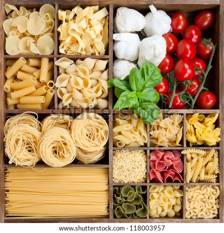 Assorted Pastas In Wooden Box With Cooking Ingredients