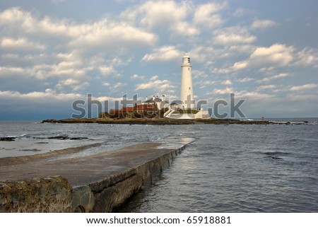 Dramatic moody lighting at St. Mary\'s Lighthouse on the tiny St. Mary\'s Island, just north of Whitley Bay on the coast of North East England.