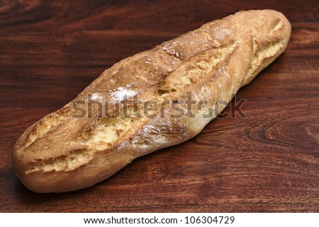 Baked italian bread on a wooden table