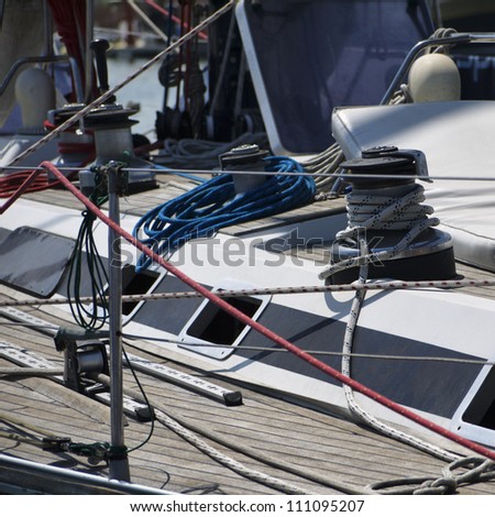 Italy, Sicily, Mediterranean Sea, sailing boat in a marina, winch and nautical cables