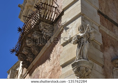 Italy, Sicily, Ragusa Ibla, the baroque facade of Cosentini Palace (Unesco monument), ornamental statue