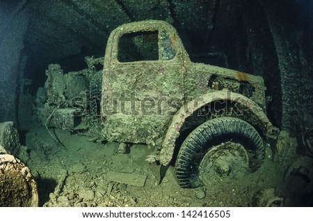 SUDAN, Red Sea, U.W. photo, Umbria wreck, an old truck in the hold of the sunken ship - FILM SCAN
