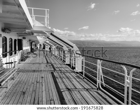 Italy, Sicily channel, view of the calabria coastline, on board of one of the many ferryboats that connect Sicily to the italian peninsula crossing the channel