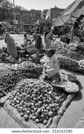 India, Rajasthan, Jaipur; 26 January 2007, indian people selling vegetables in a local market - EDITORIAL