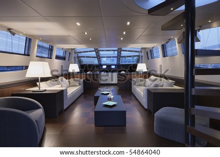 Italy, luxury yacht Tecnomar 36 (36 meters), dinette and staircase to the upper level (flybridge)