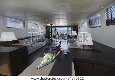 Italy, luxury yacht Tecnomar 36 (36 meters), dinette and staircase to the upper level (flybridge)