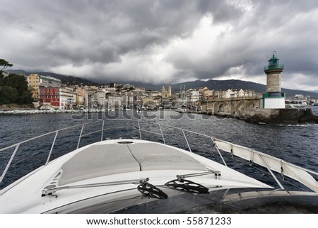 France, Corsica, Bastia, view of the port light and the town from the sea