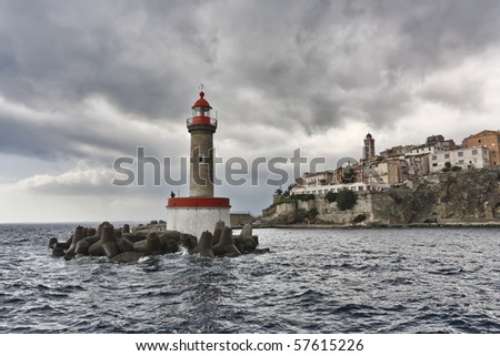 France, Corsica, Bastia, view of the port light and the town