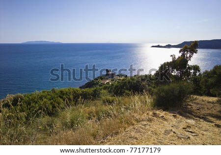 Italy, Tuscany, Tyrrhenian Sea, view of Talamone bay, Giglio and Montecristo islands in the background