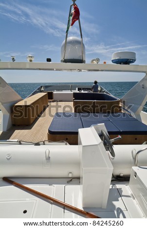 Italy, Tyrrhenian Sea, off the coast of Viareggio (Tuscany), Tecnomar 35 luxury yacht, flybridge