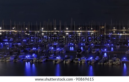Italy, Siciliy, Mediterranean sea, Marina di Ragusa, view of luxury yachts in the marina at night