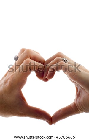 stock photo : Valentine: Love - Heart shape being made by a couple, female