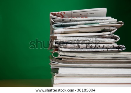Stack of reading and research magazines and newspaper, a fading way we find information today