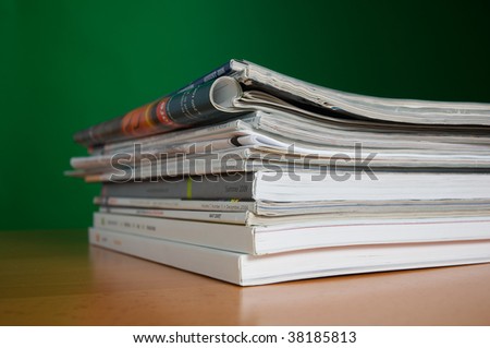 Stack of reading and research magazines, a fading way we find information today