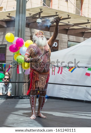 ADELAIDE, AUSTRALIA - NOVEMBER 3: Australian aboriginal in traditional costume performs at Adelaide Multicultural Festival on November 3, 2013 in Rundle Mall, Adelaide, Australia.