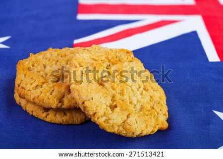 Traditional  Anzac biscuits on  Australian flag as background