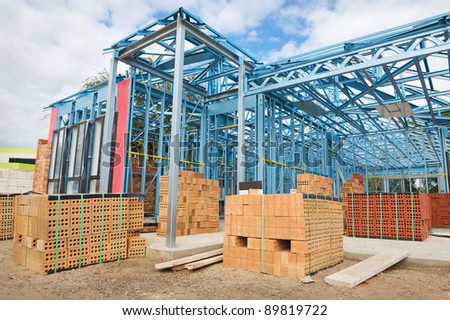 New residential construction home metal framing  against the blue sky