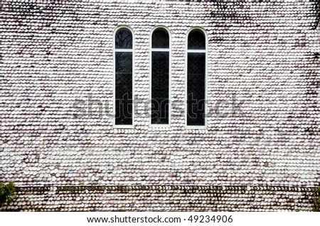three windows on the shell wall