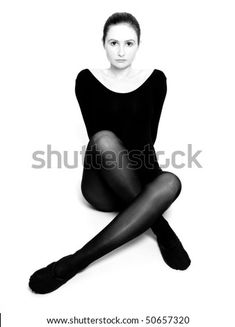Black And White Ballet Dancer. stock photo : Ballet dancer, isolated on white. In high key. Black and