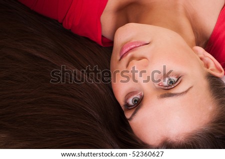 Beautiful woman with gorgeous dark hair. Upside down